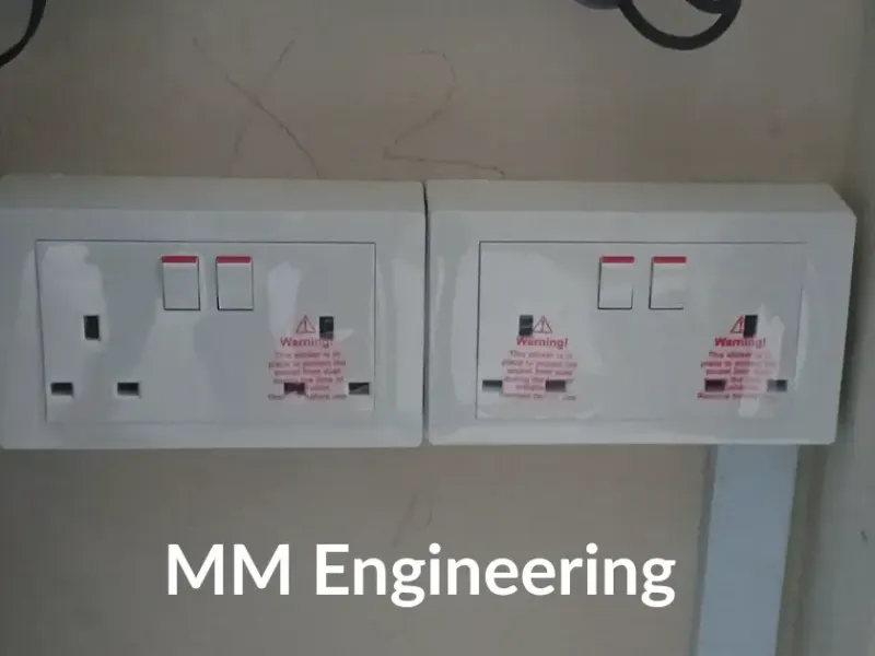 New 13A power sockets installed on a wall in Singapore